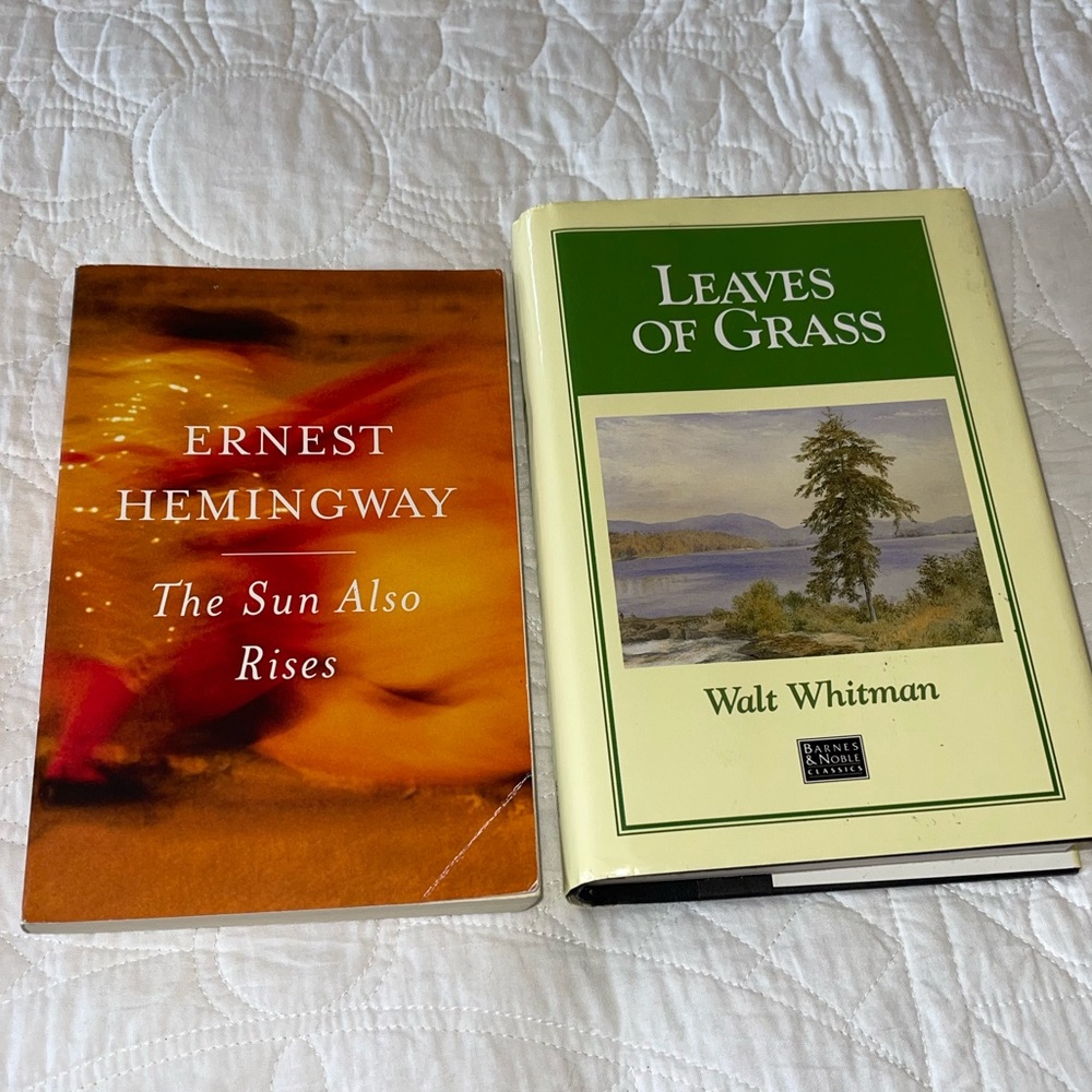 Two classic books: Leaves of Grass by Whitman & The Sun Also Rises by Hemingway